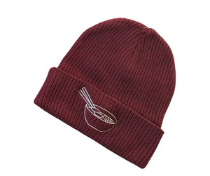 Burgundy beanie with white thread embroidery.