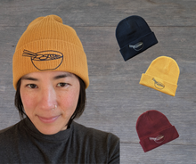 Load image into Gallery viewer, Mustard beanie shown on 21.5&quot; head circumference model.