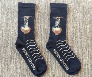 Size Small right-side profile showing Ramen Giving along side of sole.